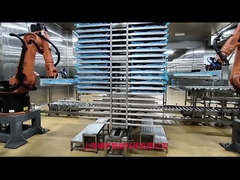 Yere monte edilmiş endüstriyel robot hücresi 2033 mm erişim ve yaklaşık 665 kg ağırlık.