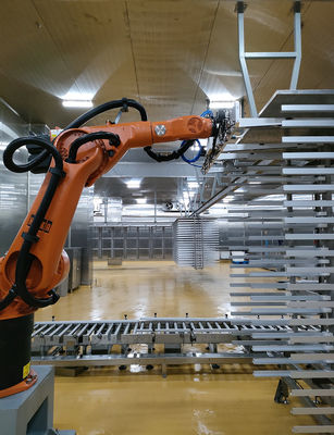 Yere monte edilmiş endüstriyel robot hücresi 2033 mm erişim ve yaklaşık 665 kg ağırlık.